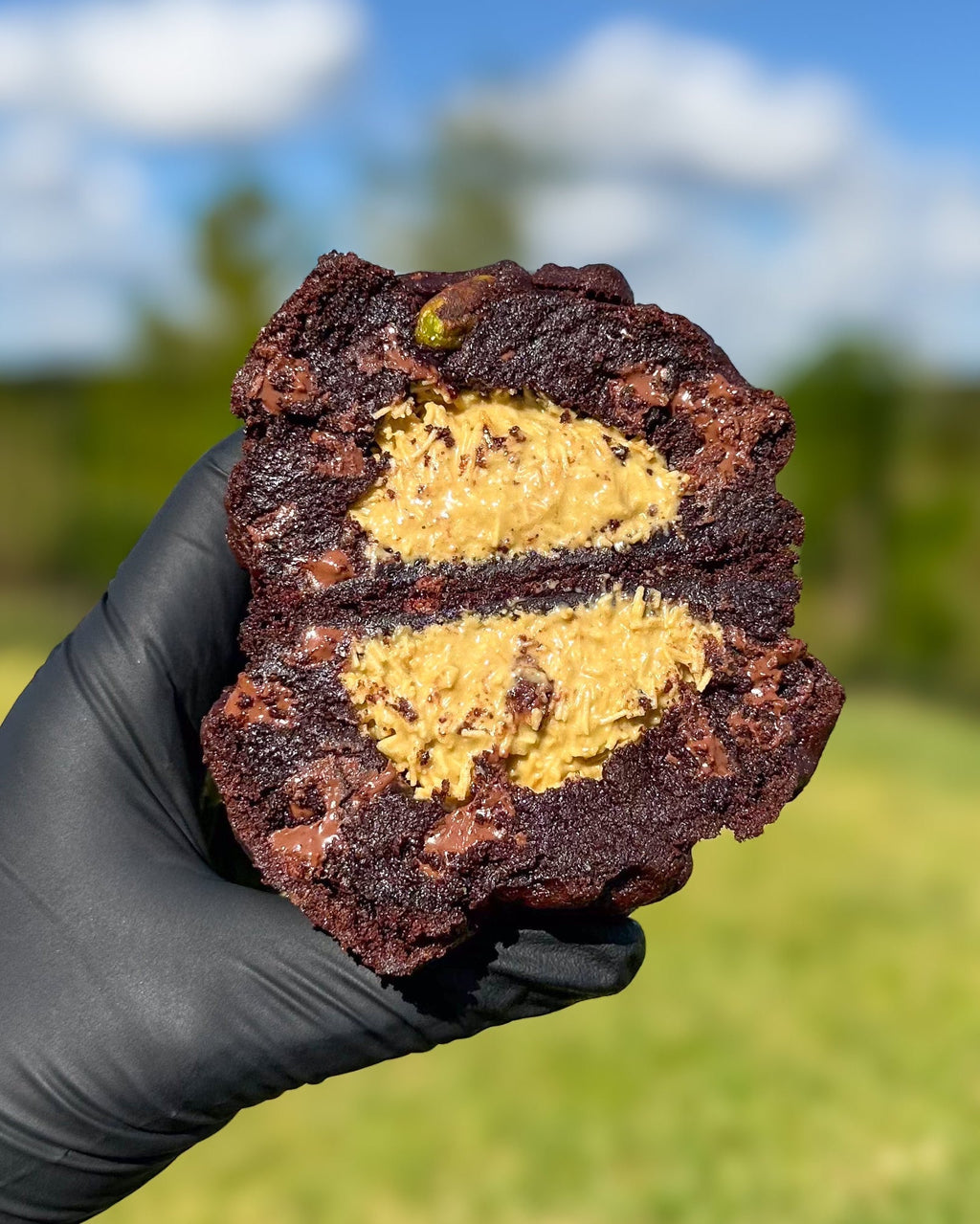 Fresh baked Dubai chocolate stuffed cookie with kataifi pistachio cream tahini milk chocolate gourmet NY style thick soft cookie shipped nationwide Star Cookies Orlando