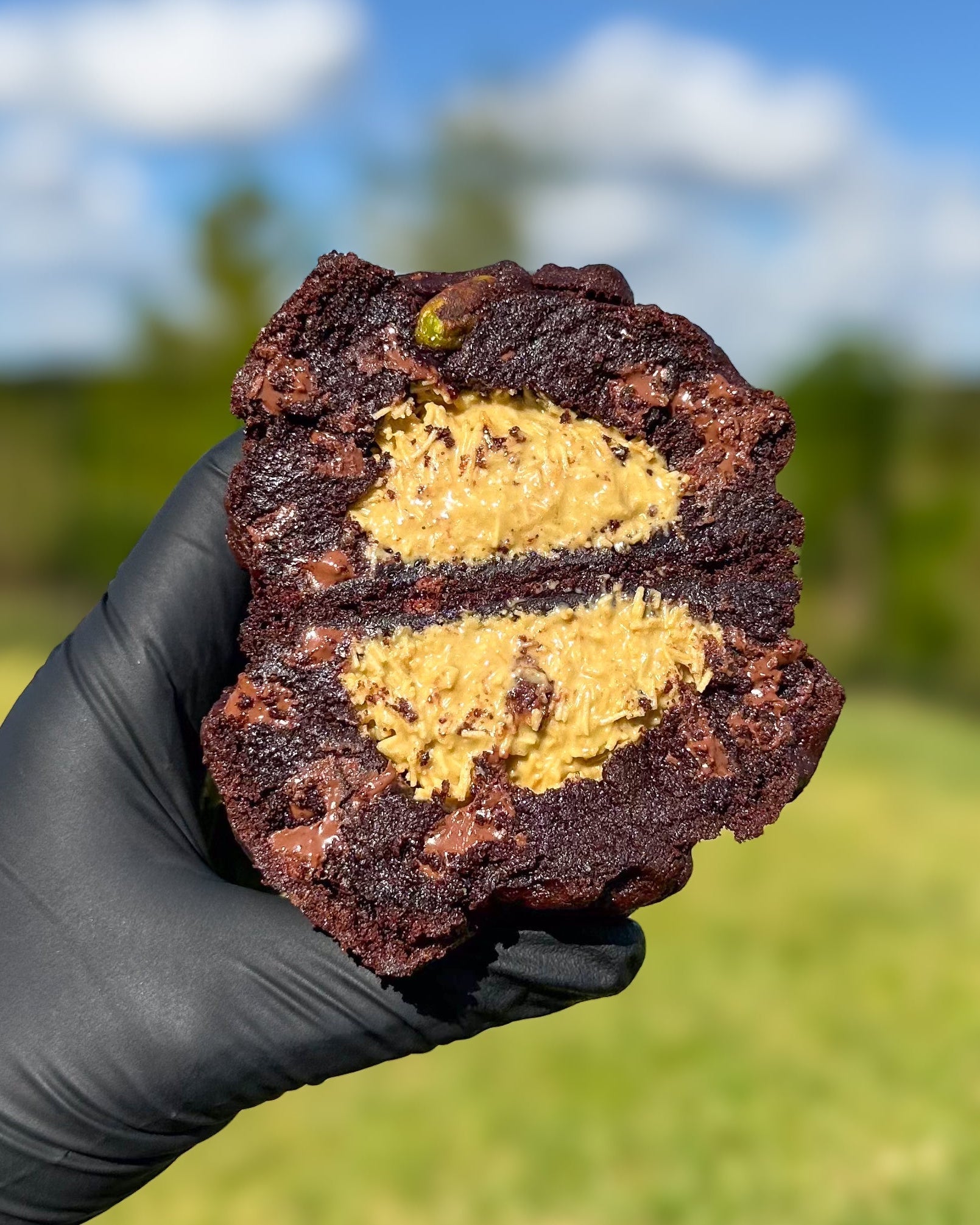 Fresh baked Dubai chocolate stuffed cookie with kataifi pistachio cream tahini milk chocolate gourmet NY style thick soft cookie shipped nationwide Star Cookies Orlando