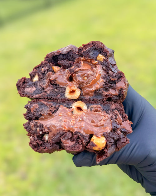 Fresh baked Ferrero Rocher stuffed cookie with Nutella hazelnut and milk chocolate gourmet NY style thick soft cookie shipped nationwide Star Cookies Orlando