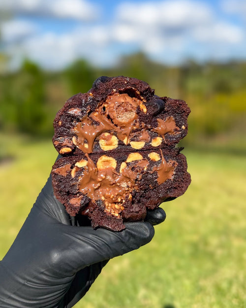Fresh baked Ferrero Rocher stuffed cookie with Nutella hazelnut and milk chocolate gourmet NY style thick soft cookie shipped nationwide Star Cookies Orlando