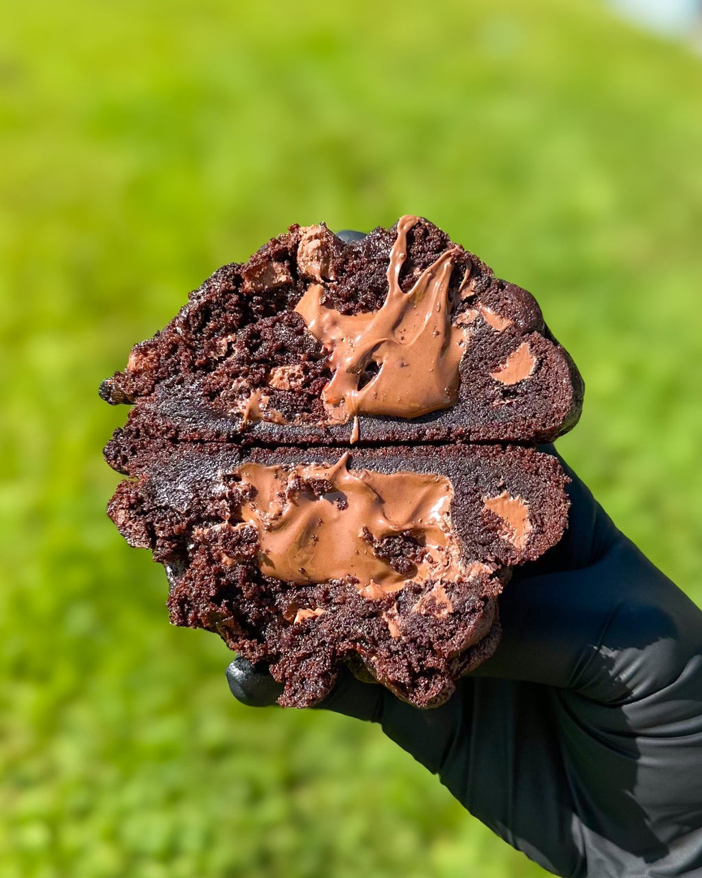 Fresh baked Nutella double chocolate stuffed cookie with milk chocolate gooey Nutella center fudgy gourmet NY style thick soft cookie shipped nationwide Star Cookies Orlando